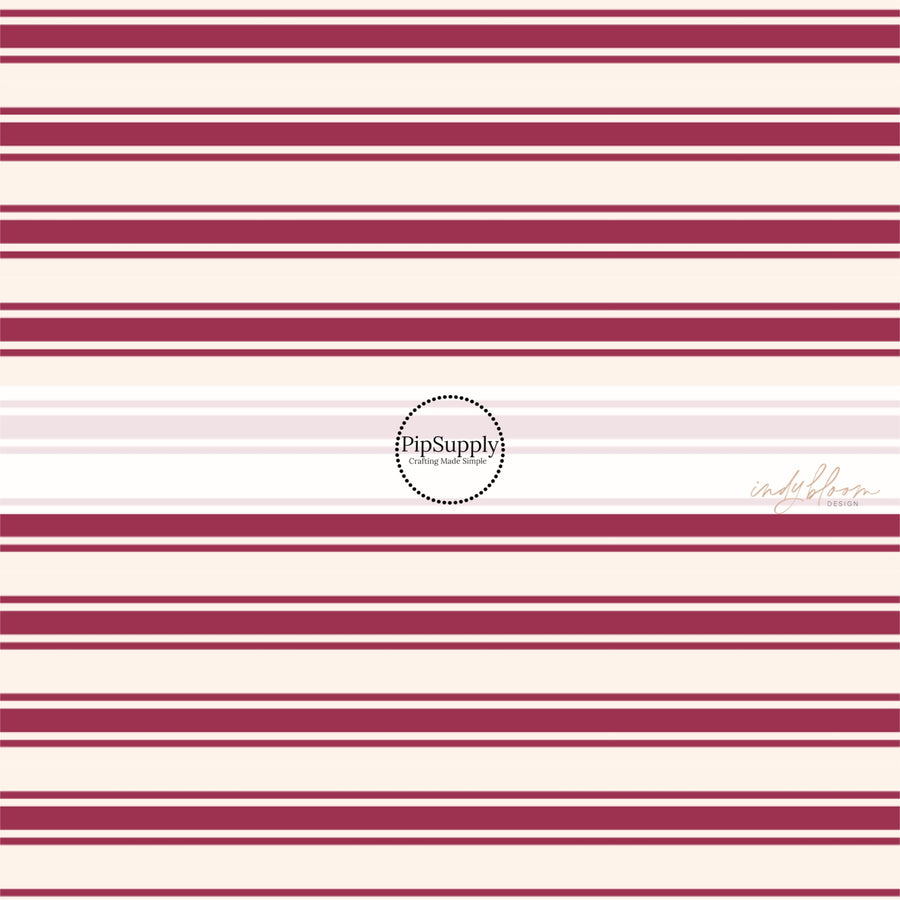 These stripe themed fabric by the yard features mulberry thin and thick stripes on cream. This fun stripe themed fabric can be used for all your sewing and crafting needs! 