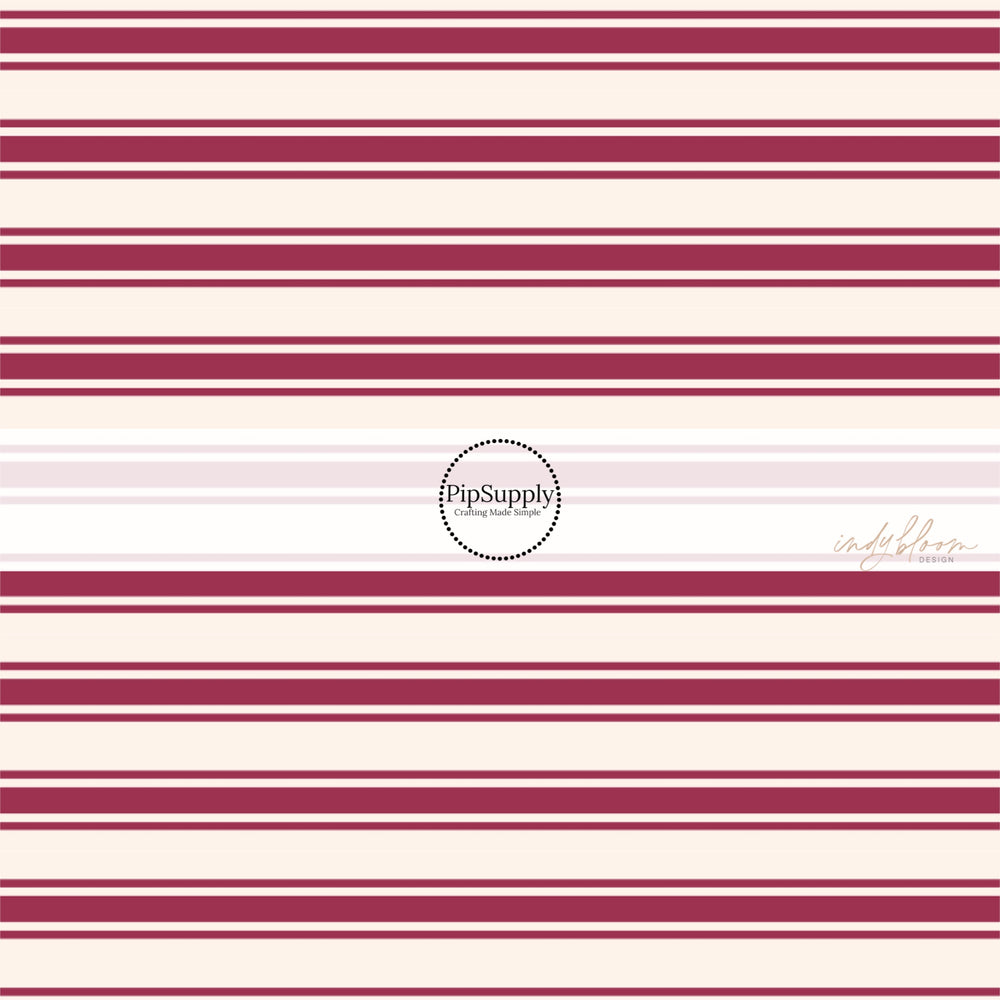 These stripe themed no sew bow strips can be easily tied and attached to a clip for a finished hair bow. These fun stripe bow strips are great for personal use or to sell. The bow stripes features mulberry thin and thick stripes on cream.