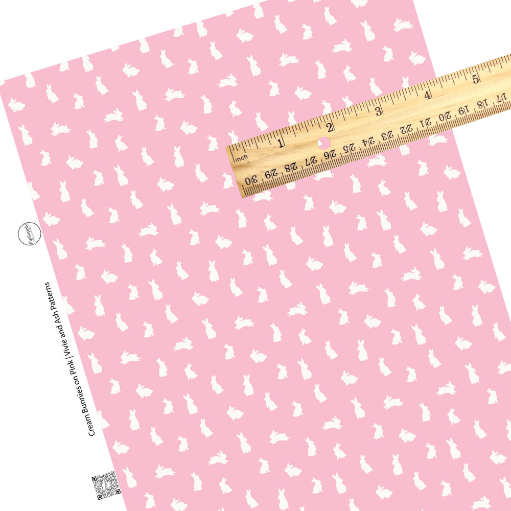 These spring pattern themed faux leather sheets contain the following design elements: cream bunnies on light pink. Our CPSIA compliant faux leather sheets or rolls can be used for all types of crafting projects.