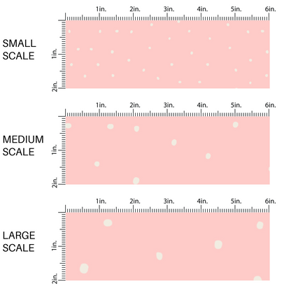 This scale chart of small scale, medium scale, and large scale of these dot themed pastel pink fabric by the yard features small white dots scattered on light pink. 