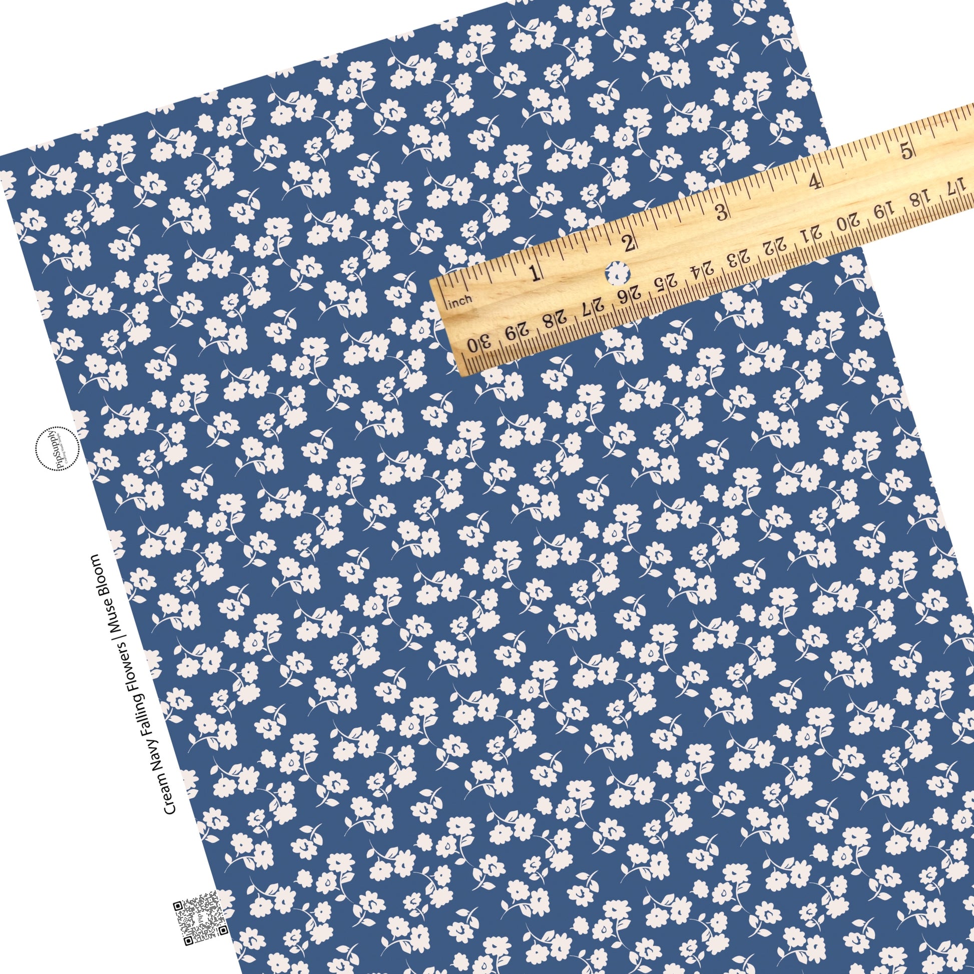 These floral themed dark blue faux leather sheets contain the following design elements: light cream flowers on navy blue.