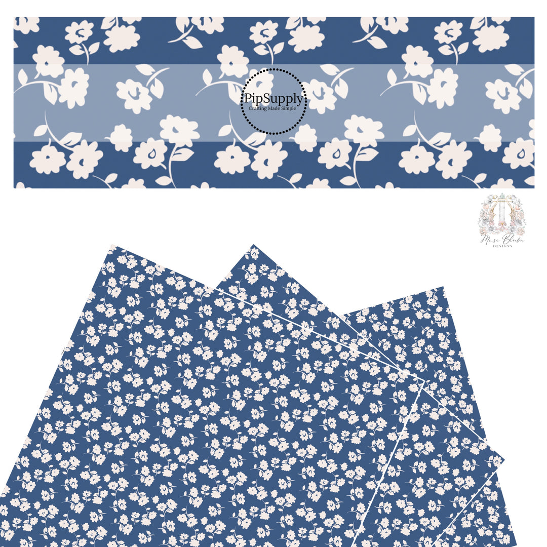 These floral themed dark blue faux leather sheets contain the following design elements: light cream flowers on navy blue.