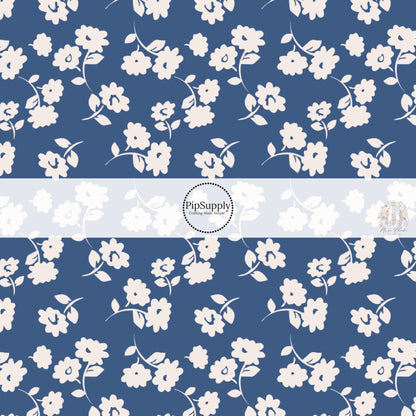 These floral themed dark blue no sew bow strips can be easily tied and attached to a clip for a finished hair bow. These fun summer floral themed bow strips features light cream flowers on navy blue are great for personal use or to sell.