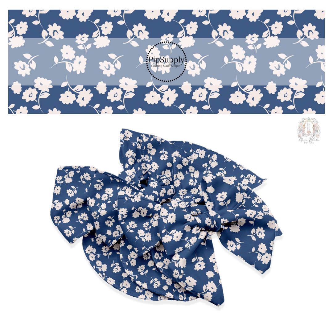 These floral themed dark blue no sew bow strips can be easily tied and attached to a clip for a finished hair bow. These fun summer floral themed bow strips features light cream flowers on navy blue are great for personal use or to sell.