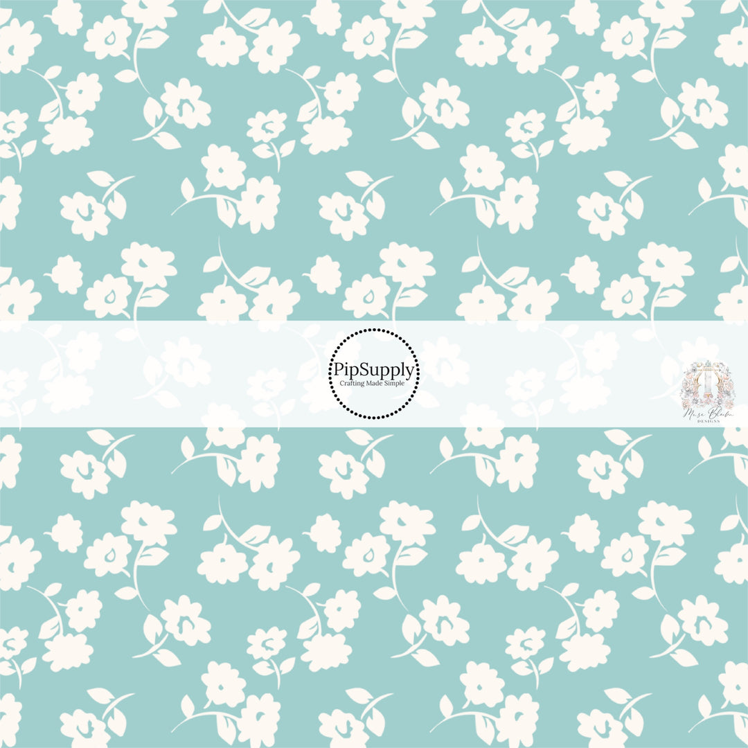 These floral themed seafoam no sew bow strips can be easily tied and attached to a clip for a finished hair bow. These fun summer floral themed bow strips features light cream flowers on seafoam are great for personal use or to sell.