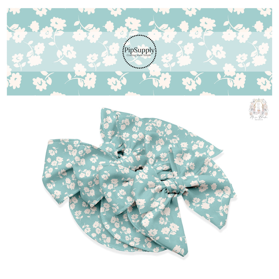 These floral themed seafoam no sew bow strips can be easily tied and attached to a clip for a finished hair bow. These fun summer floral themed bow strips features light cream flowers on seafoam are great for personal use or to sell.