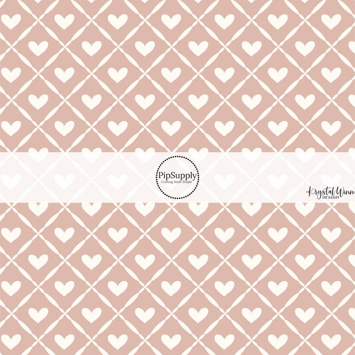 This Valentine's Day themed fabric by the yard features white hearts and white lattice pattern on pink. This fun pattern fabric can be used for all your sewing and crafting needs!