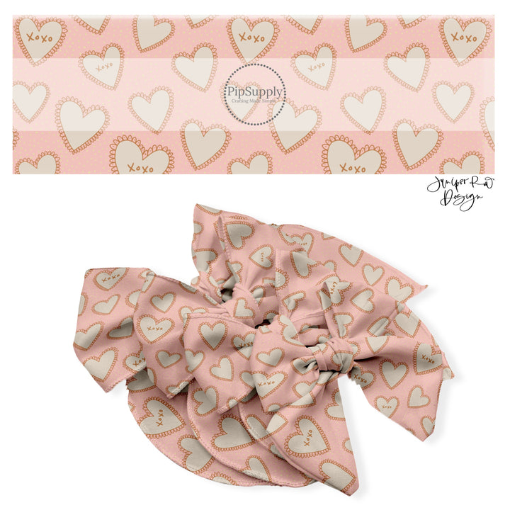 These holiday no sew bow strips can be easily tied and attached to a clip for a finished hair bow. These festive bow strips are great for personal use or to sell. These bow strips feature the following design elements: cream lace hearts on pink.