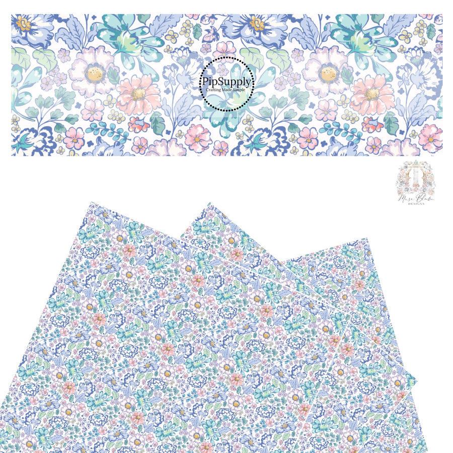 These floral themed cream faux leather sheets contain the following design elements: navy blue, light blue, teal, cream, light pink, yellow, and aqua flowers on cream. 