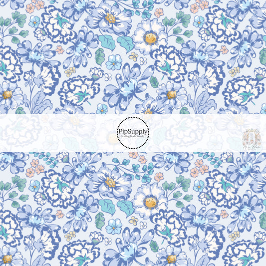 These floral themed blue fabric by the yard features navy blue, light blue, cream, yellow, and aqua flowers on periwinkle. This fun summer floral themed fabric can be used for all your sewing and crafting needs! 
