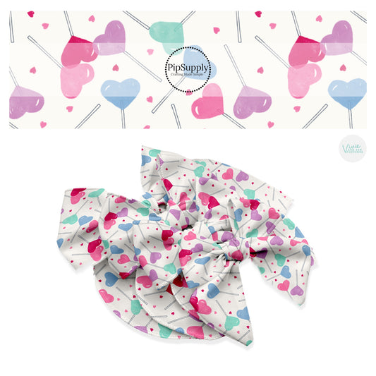 These Valentine's Day pattern no sew bow strips can be easily tied and attached to a clip for a finished hair bow. These Valentine's Day bow strips are great for personal use or to sell. The bow strips feature pastel colored lollipop candy on cream. 