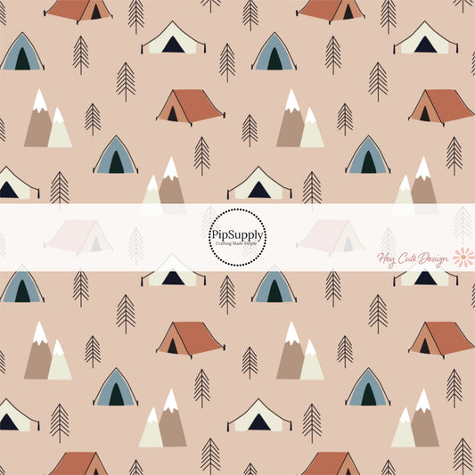 These camping outdoor light peach fabric by the yard features pine trees, mountains dark red, blue, and cream tents on light nude. This fun camping themed fabric can be used for all your sewing and crafting needs! 