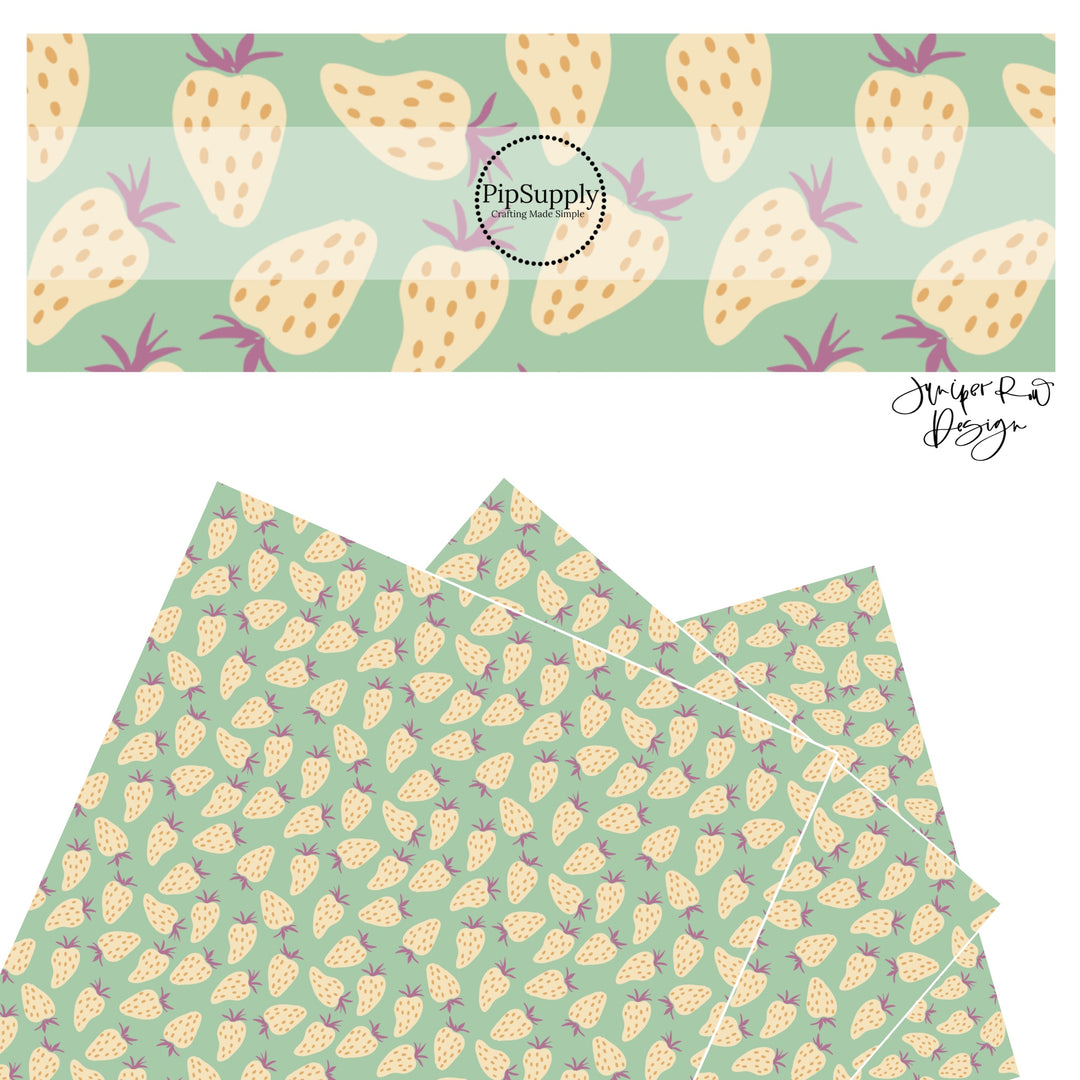 These fruit themed light mint faux leather sheets contain the following design elements: cream strawberries with orange seeds with purple stems on light mint.