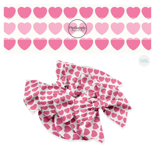 Lines of pink hearts on cream hair bow strips