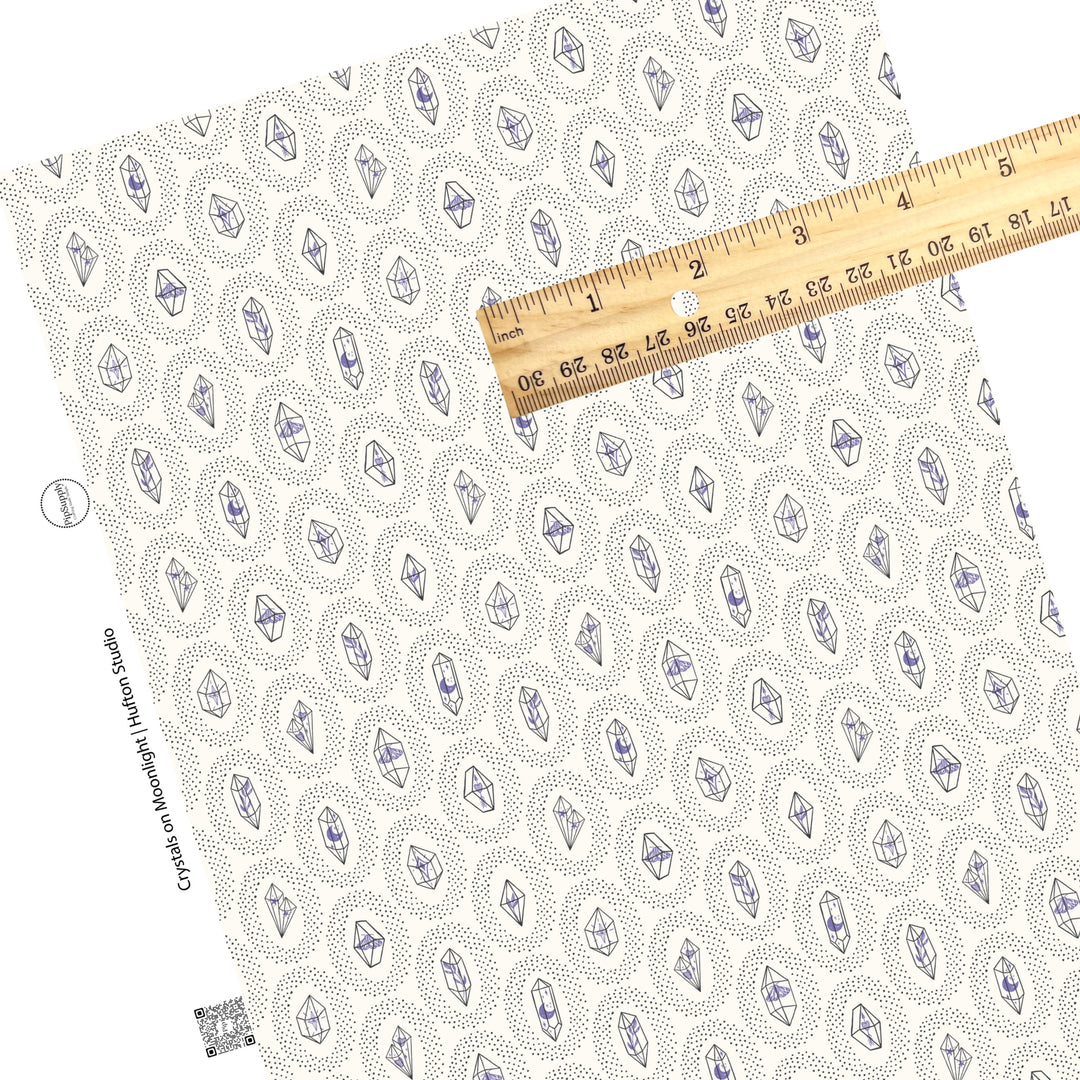 These crystal dot themed light cream faux leather sheets contain the following design elements: small black dots surrounding crystals on ivory.  Our CPSIA compliant faux leather sheets or rolls can be used for all types of crafting projects. There are periwinkle flowers, butterflies, and charms inside each crystal. 