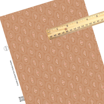 These crystal dot themed brown faux leather sheets contain the following design elements: small white dots surrounding crystals on brown.  Our CPSIA compliant faux leather sheets or rolls can be used for all types of crafting projects. 
