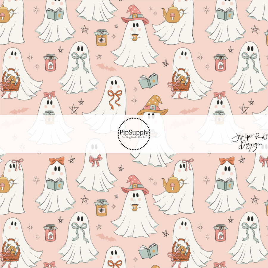 These Halloween themed pattern fabric by the yard features the following design elements: ghost on light pink. This fun spooky themed fabric can be used for all your sewing and crafting needs!