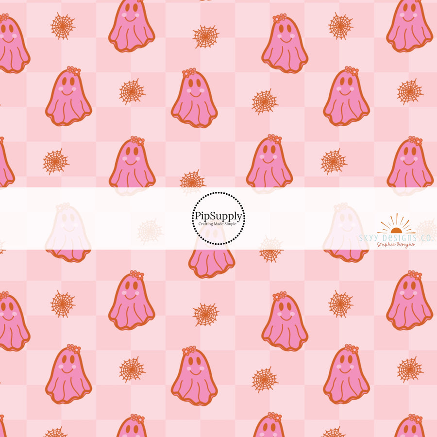 These Halloween themed pattern fabric by the yard features the following design elements: ghost on pink checker pattern. This fun spooky themed fabric can be used for all your sewing and crafting needs!