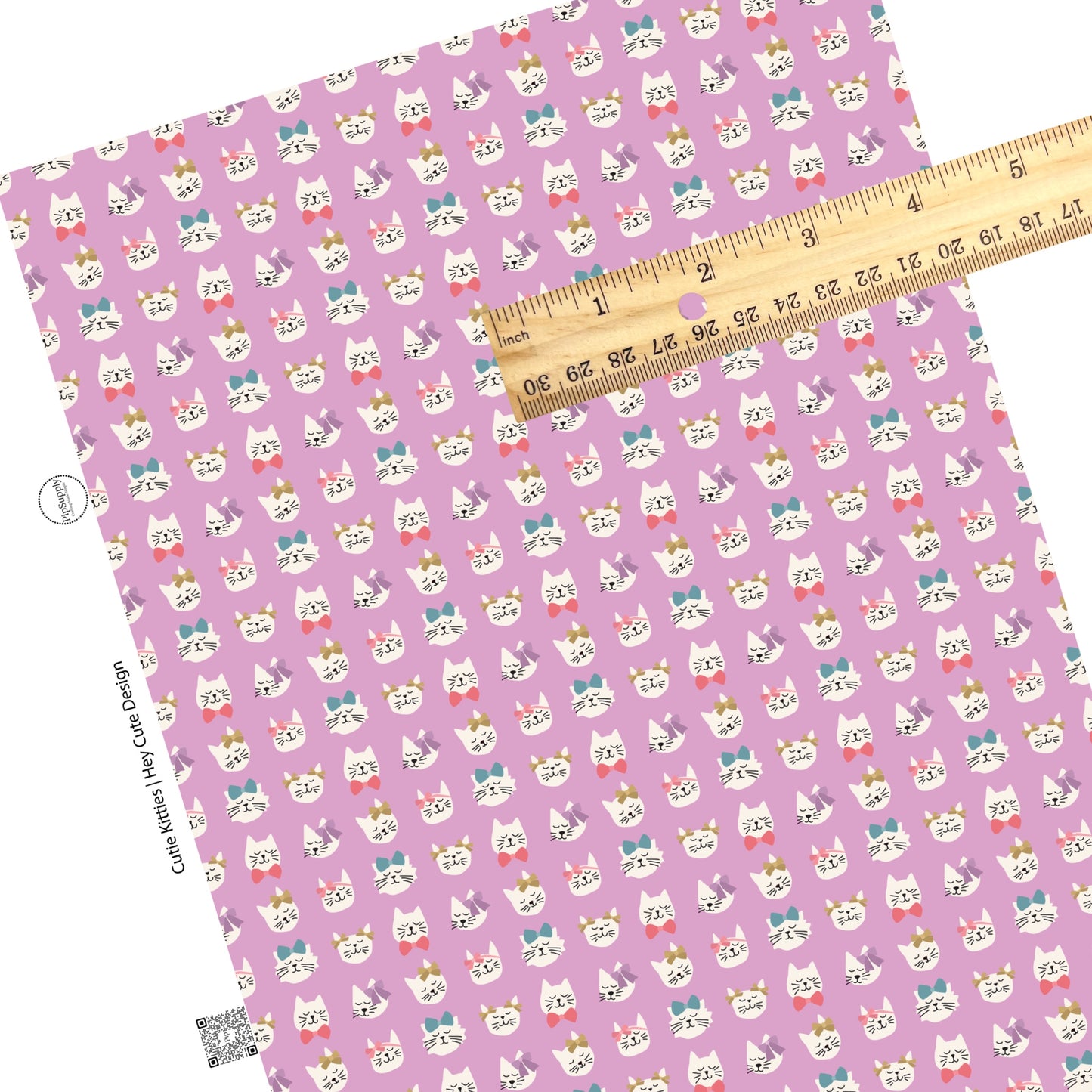 These Valentine's pattern themed faux leather sheets contain the following design elements: kitties with colorful bows on light purple. Our CPSIA compliant faux leather sheets or rolls can be used for all types of crafting projects.