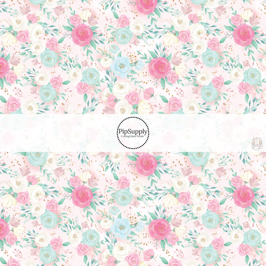 This spring floral fabric by the yard features pink and blue spring flowers. This seasonal pattern fabric can be used for all your sewing and crafting needs!