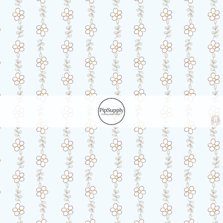 This spring floral fabric by the yard features tiny daisies on light blue. This seasonal pattern fabric can be used for all your sewing and crafting needs!