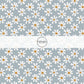 This summer fabric by the yard features white daisies on blue. This fun summer themed fabric can be used for all your sewing and crafting needs!