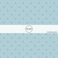 These dot themed blue fabric by the yard features blue dots on pastel blue. This fun summer dot themed fabric can be used for all your sewing and crafting needs! 