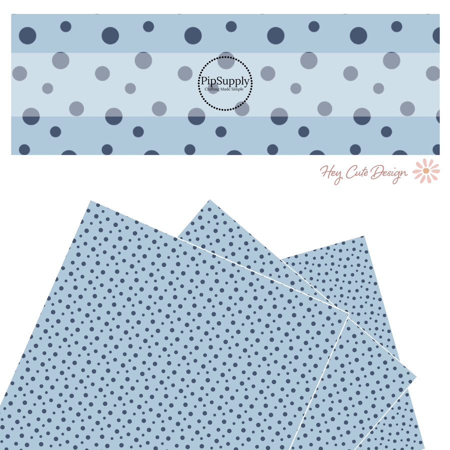 These dot themed light blue faux leather sheets contain the following design elements: small dark blue dots on light blue.