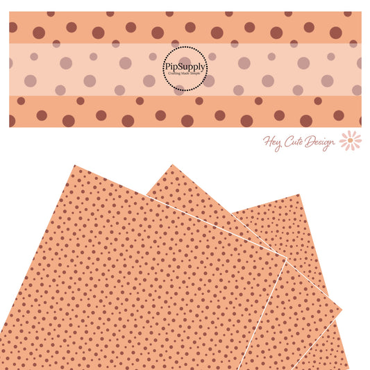 These dot themed light orange faux leather sheets contain the following design elements: small dark orange and brown dots on light peach.