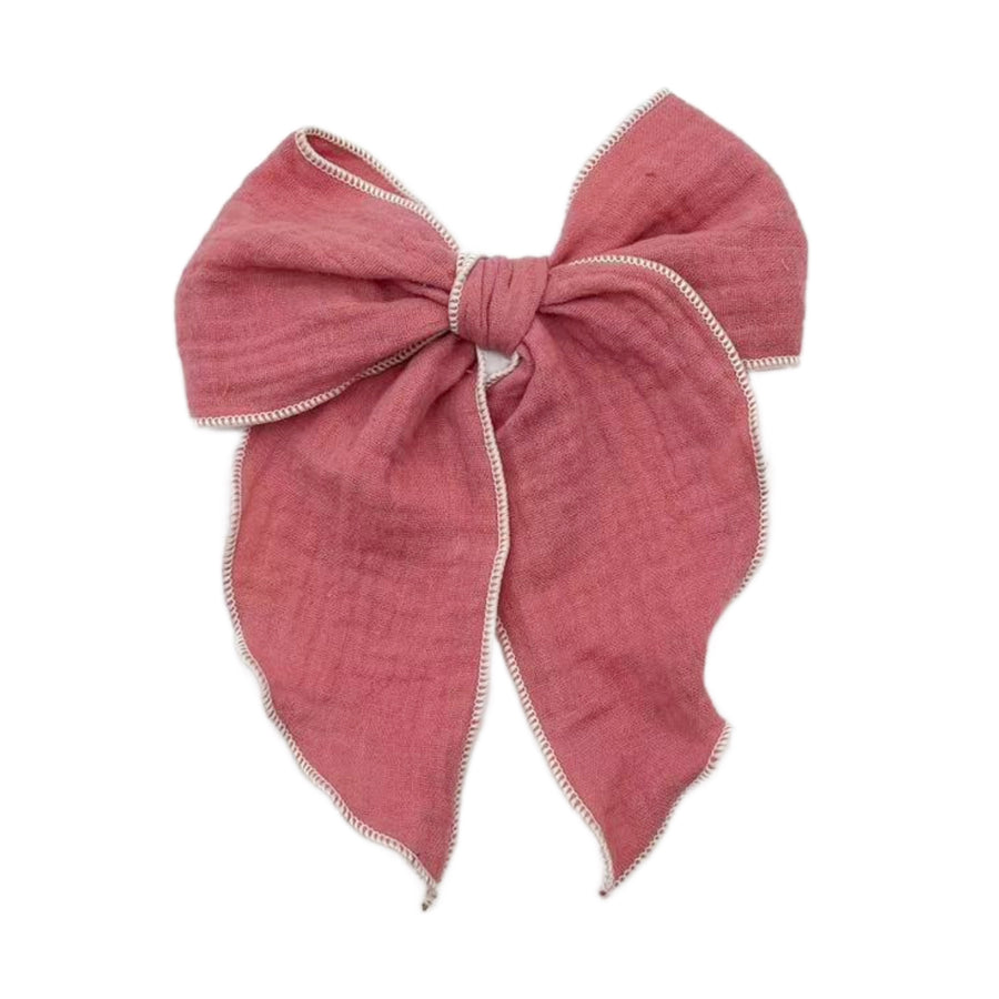 These solid pre-cut tied bows are ready to package and resell to your customers no sewing or measuring necessary! These hair bows come with a clip already attached.