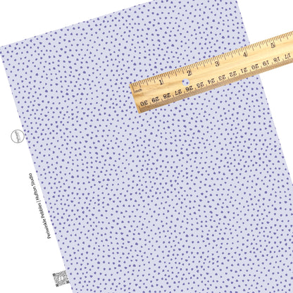 These dot themed light purple faux leather sheets contain the following design elements: dark purple small dots on pale purple. Our CPSIA compliant faux leather sheets or rolls can be used for all types of crafting projects. 
