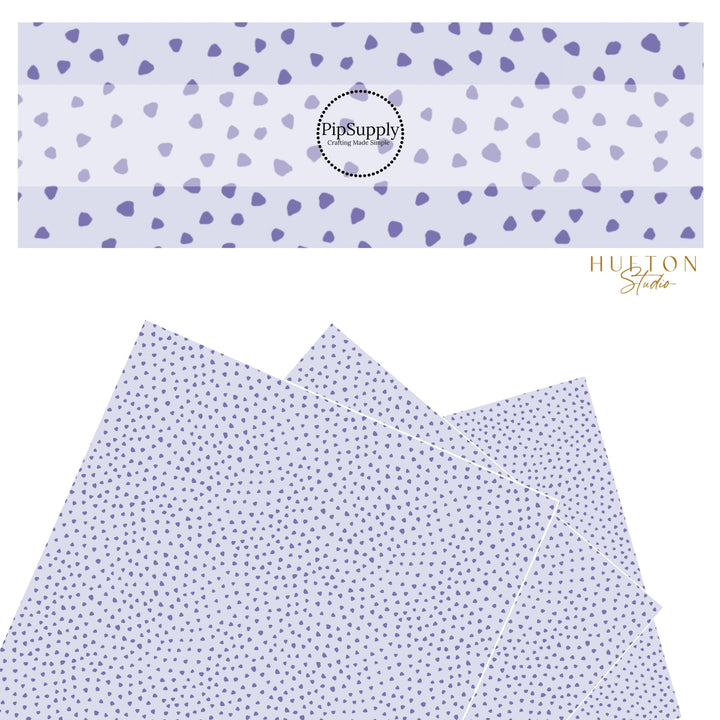 These dot themed light purple faux leather sheets contain the following design elements: dark purple small dots on pale purple. Our CPSIA compliant faux leather sheets or rolls can be used for all types of crafting projects. 