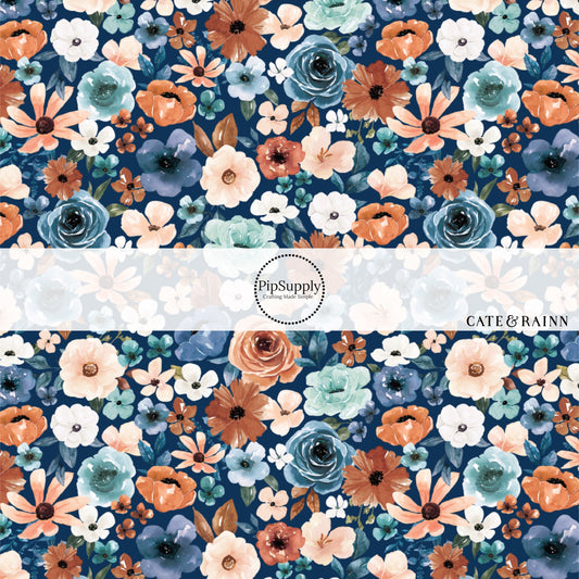 These floral themed royal blue fabric by the yard features cream, light pink, orange, teal, and blue watercolor floral flowers on dark blue. This fun floral summer themed fabric can be used for all your sewing and crafting needs! 