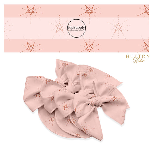 These star themed blush no sew bow strips can be easily tied and attached to a clip for a finished hair bow. These fun star themed bow strips features dark red outlined stars on light pink are great for personal use or to sell.