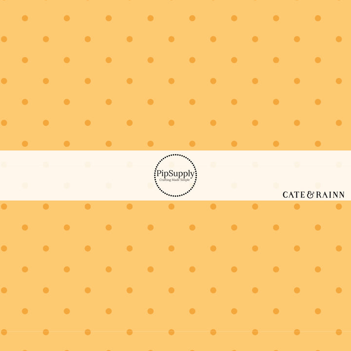 These dot themed marigold fabric by the yard features dark orange dots on light orange. This fun summer dot themed fabric can be used for all your sewing and crafting needs! 