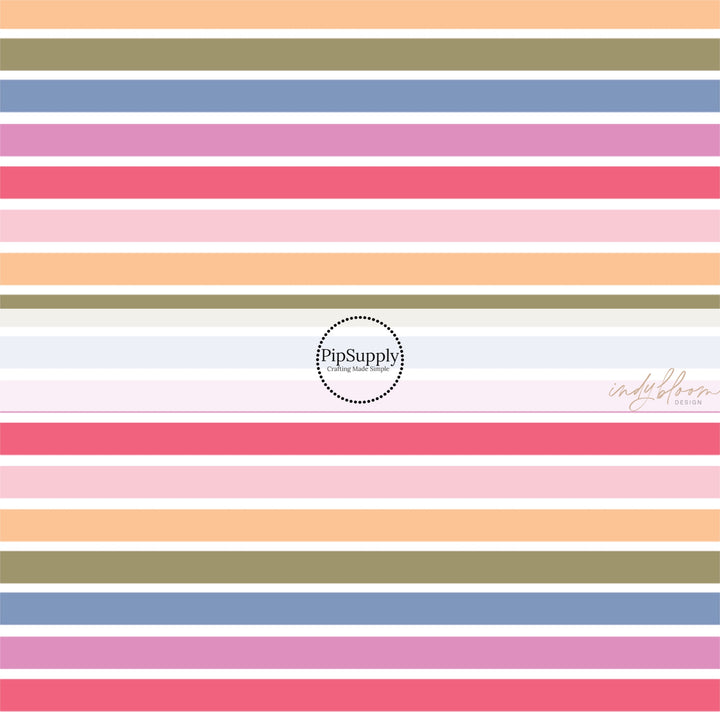 This summer fabric by the yard features colorful stripes on cream. This fun summer themed fabric can be used for all your sewing and crafting needs!