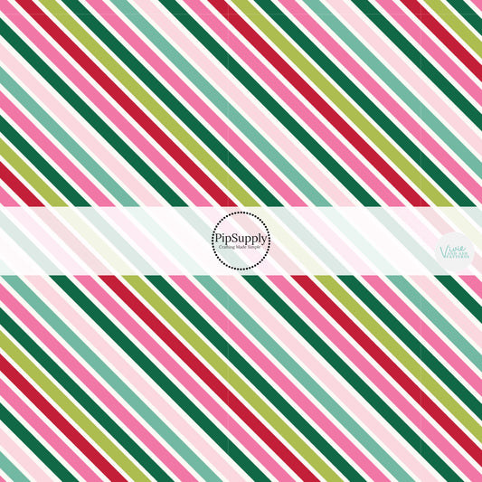 These winter stripe themed pattern fabric by the yard features the following design elements: colorful Christmas diagonal stripe pattern. This fun themed fabric can be used for all your sewing and crafting needs!