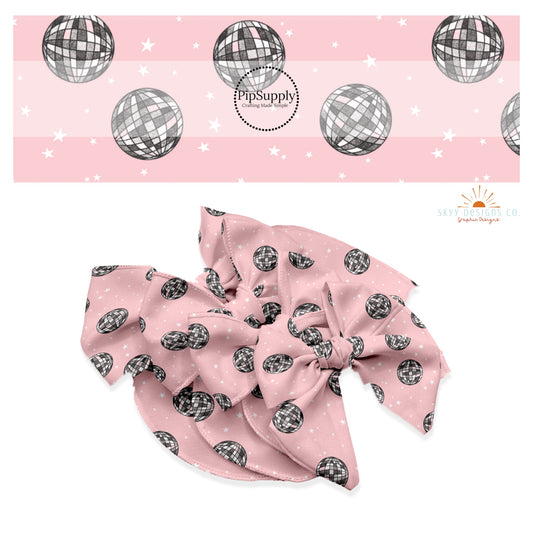 White stars and gray disco balls on pink hair bow strips