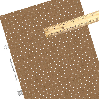 White polka dots on distressed brown faux leather sheets
