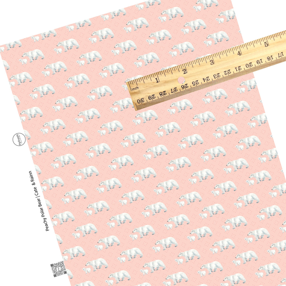 Mama bear and baby bear on polka dot peach faux leather sheets