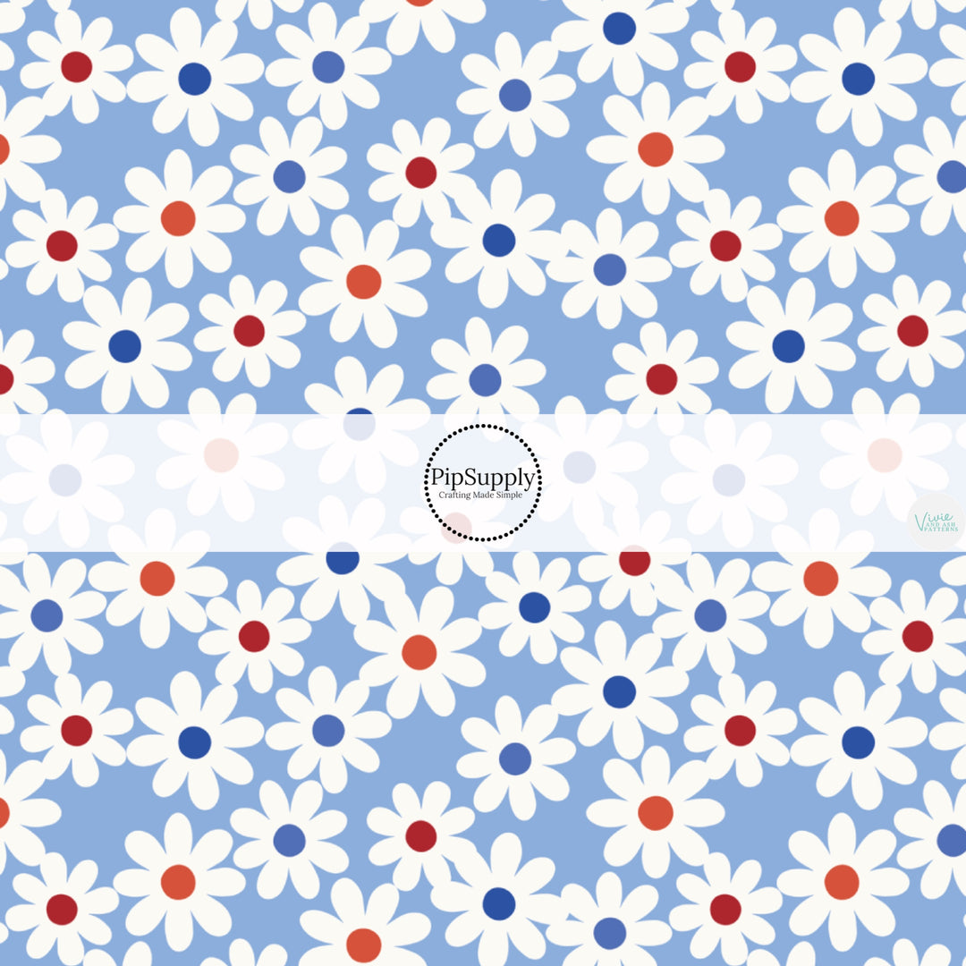 This 4th of July fabric by the yard features daisies on blue. This fun patriotic themed fabric can be used for all your sewing and crafting needs!