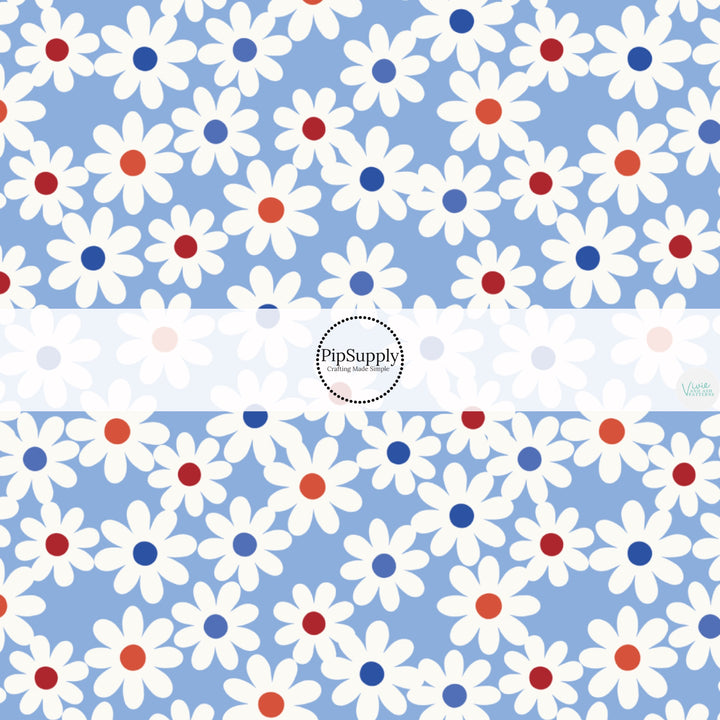 This 4th of July fabric by the yard features daisies on blue. This fun patriotic themed fabric can be used for all your sewing and crafting needs!