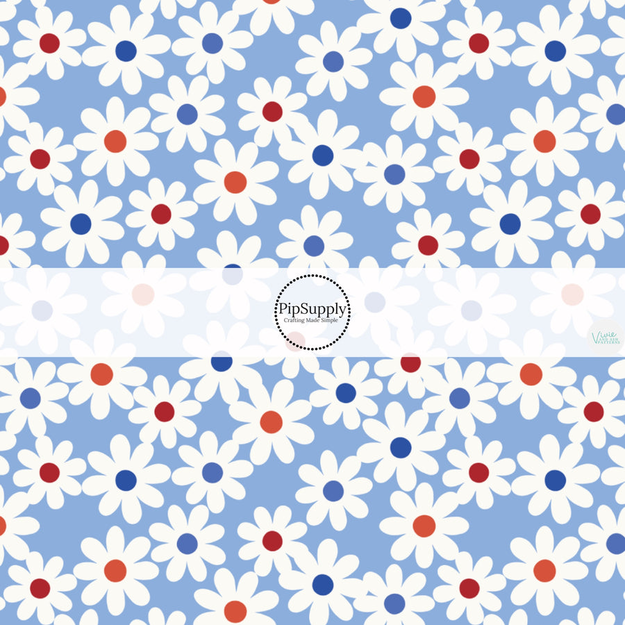 This 4th of July fabric by the yard features daisies on blue. This fun patriotic themed fabric can be used for all your sewing and crafting needs!