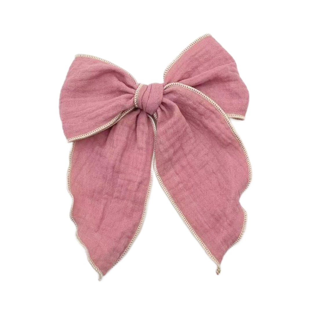 These solid pre-cut tied bows are ready to package and resell to your customers no sewing or measuring necessary! These hair bows come with a clip already attached.