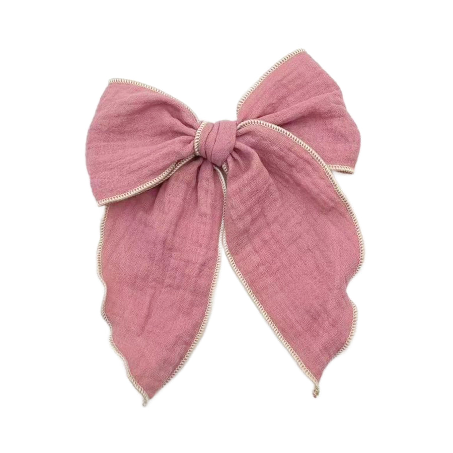 These solid pre-cut tied bows are ready to package and resell to your customers no sewing or measuring necessary! These hair bows come with a clip already attached.