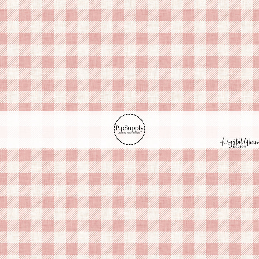 These winter plaid themed pattern fabric by the yard features the following design elements: pink gingham pattern. This fun themed fabric can be used for all your sewing and crafting needs!