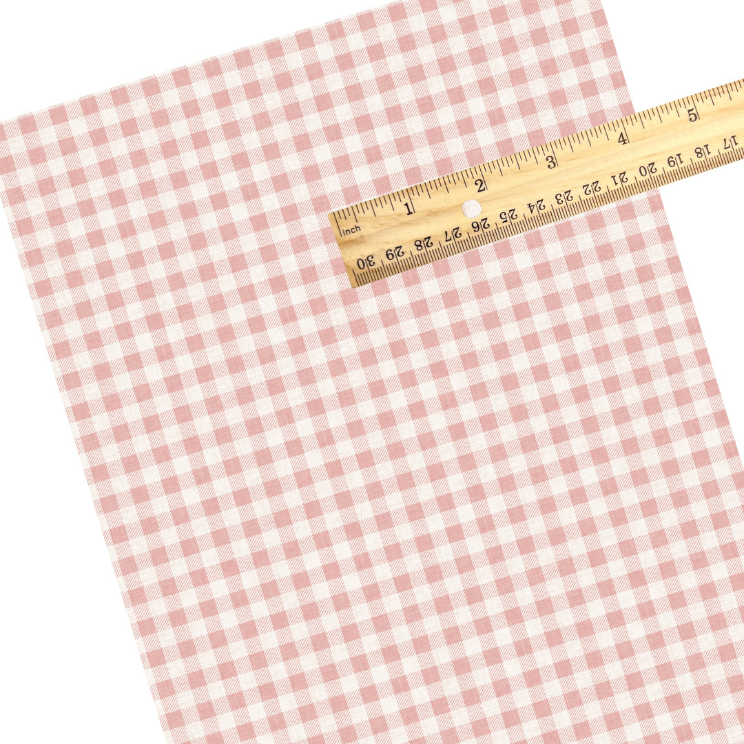 These winter plaid themed pattern faux leather sheets contain the following design elements: pink gingham pattern. Our CPSIA compliant faux leather sheets or rolls can be used for all types of crafting projects.