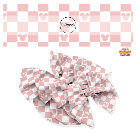These magical inspired themed no sew bow strips can be easily tied and attached to a clip for a finished hair bow. These fun themed patterned bow strips are great for personal use or to sell. These bow strips feature the following dusty pink and cream checker pattern with mouse ears.