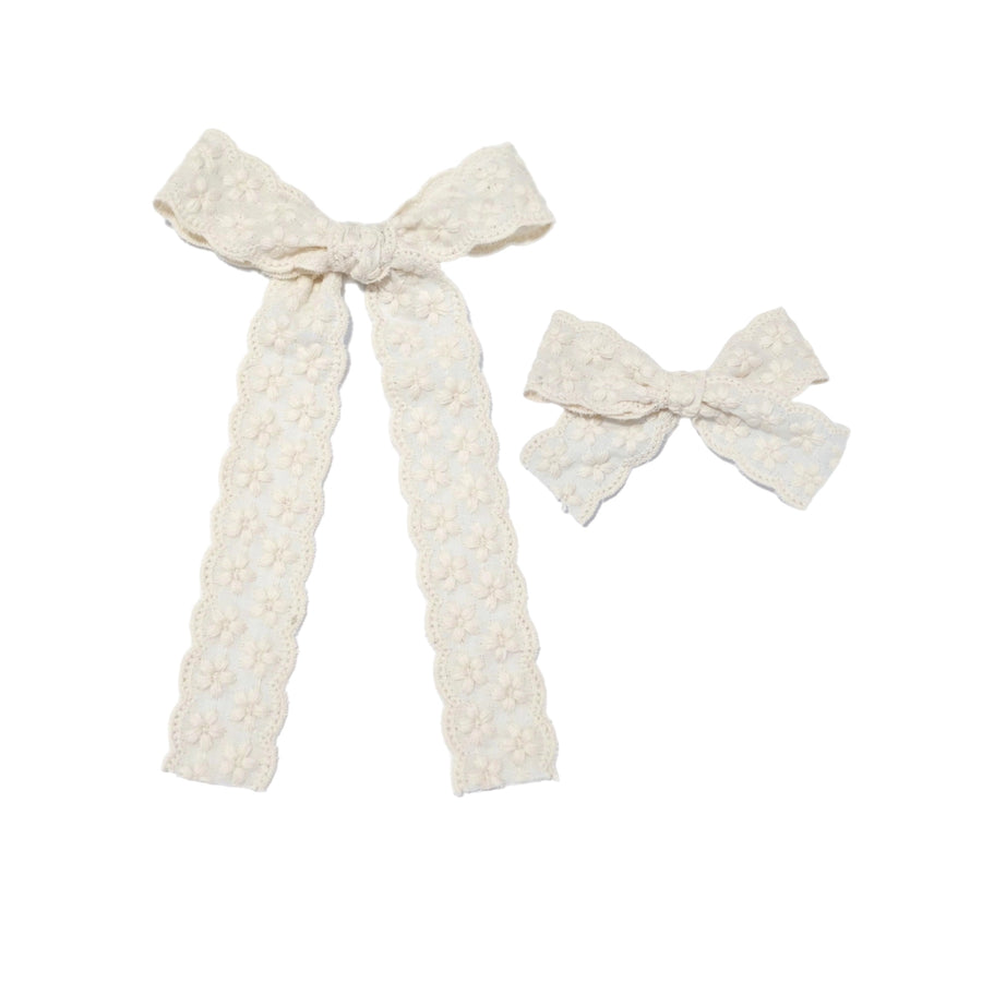 These embroidered solid floral tied bows are ready to package and resell to your customers no sewing or measuring necessary! These hair bows come with a clip already attached.