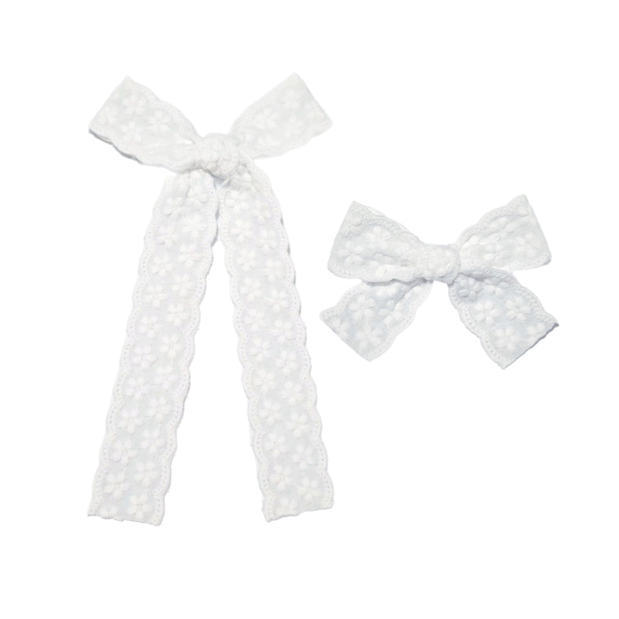 These embroidered solid floral tied bows are ready to package and resell to your customers no sewing or measuring necessary! These hair bows come with a clip already attached.